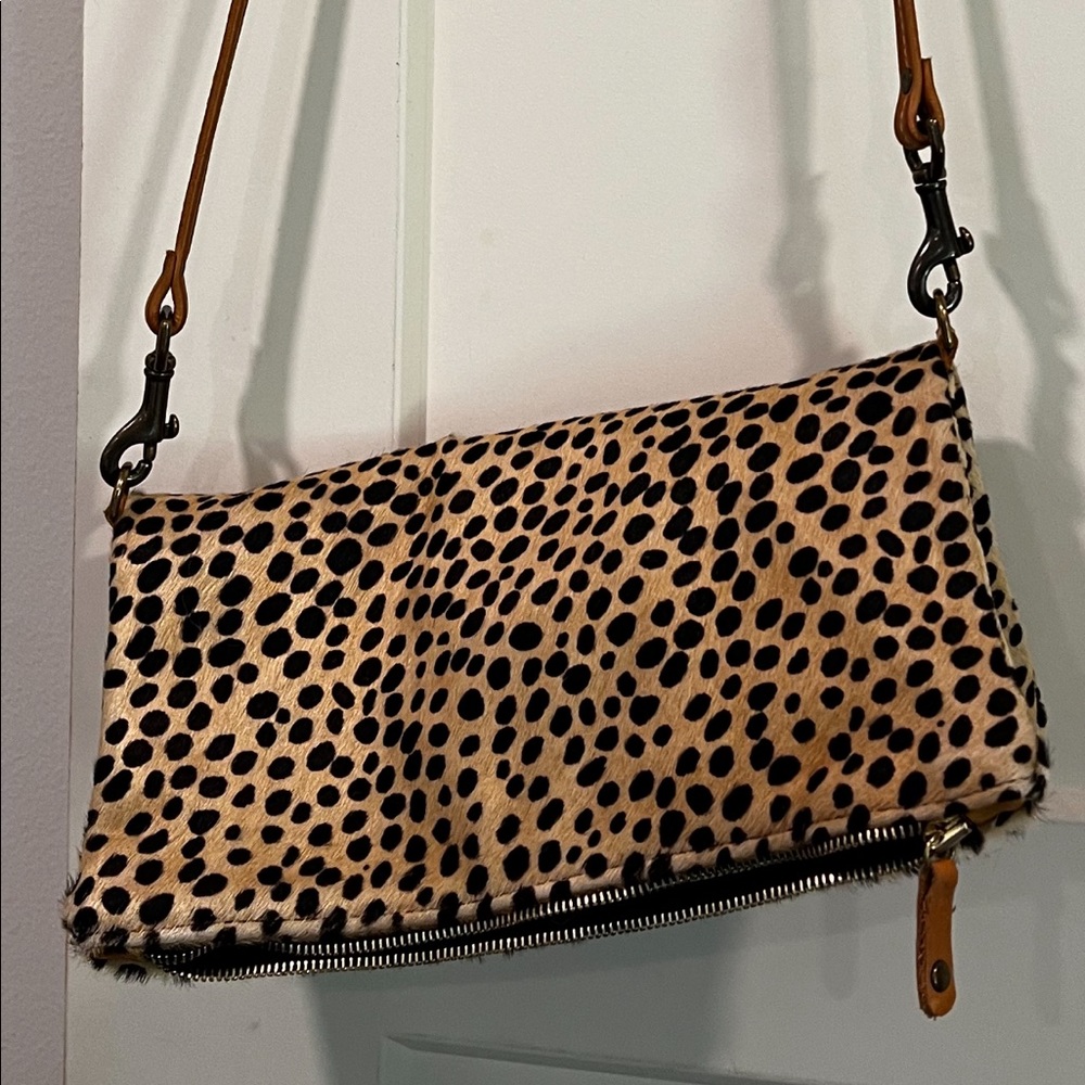 Cori Hoover pony fur animal print crossbody with messenger fold.